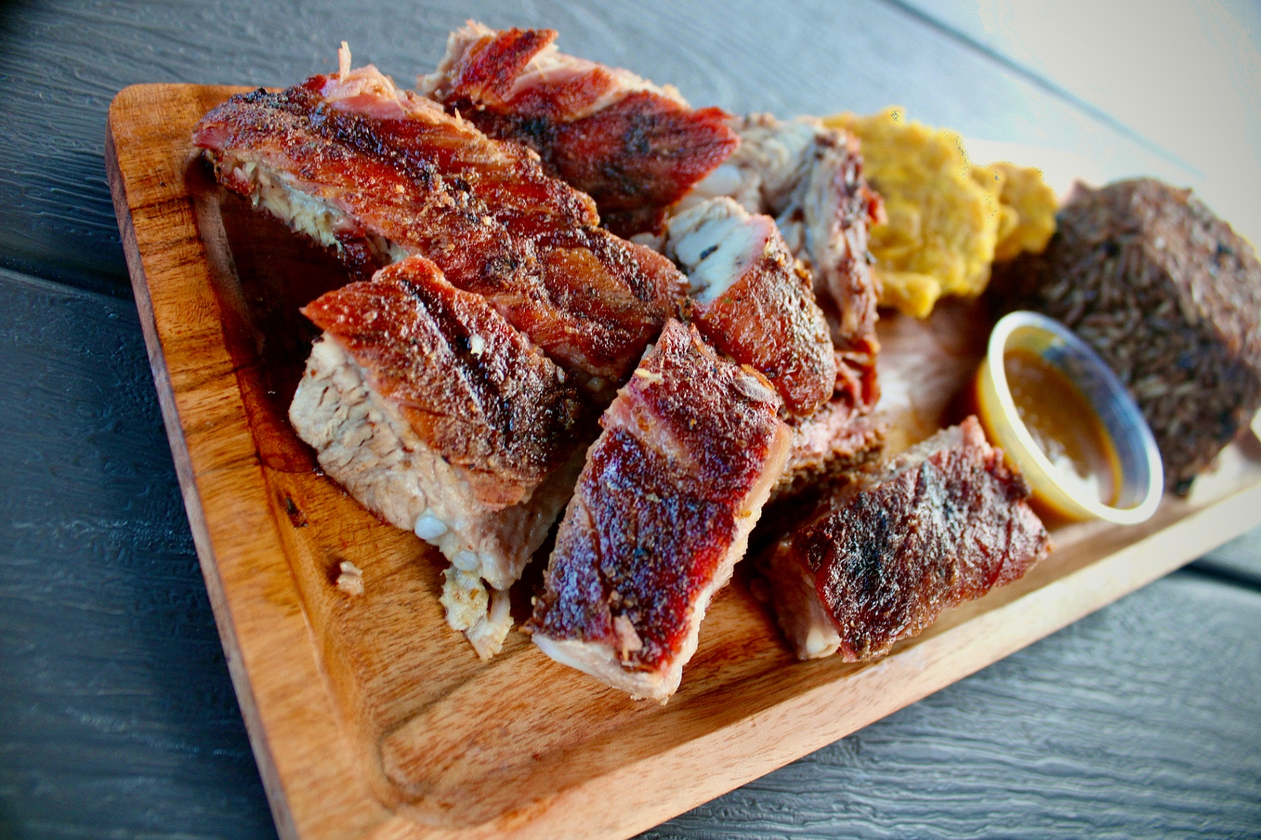 Slow-smoked BBQ ribs platter at Natalie's BBQ Shack in Miami
